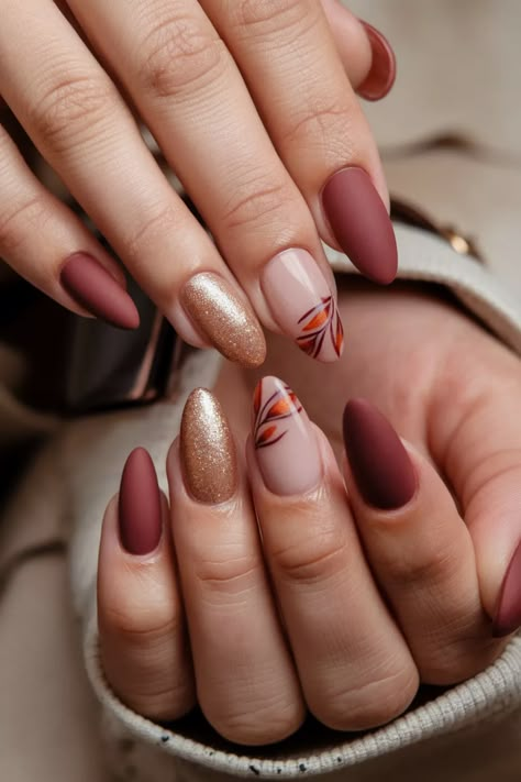 Dive into the beauty of the season with these stunning almond-shaped fall nail ideas! Imagine your nails adorned with rich burgundies, golden hues, and warm earth tones, perfectly capturing the essence of autumn. This chic nail style not only elongates your fingers but also allows intricate designs that reflect falling leaves and cozy vibes. Elevate your autumn look and let your nails do the talking! Thanksgiving Nails Acrylic Almond, November Nails Almond, Simple Fall Nails Almond, Almond Shaped Fall Nails, Fall Almond Shaped Nails, Fall Almond Nails, Warm Earth Tones, November Nails, Fall Nail Ideas