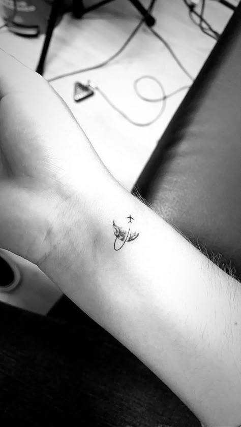 Gratitude Tattoo Ideas For Women, Travel Minimal Tattoo, Plane And Moon Tattoo, Tattoo Airplane Travel, Micro Travel Tattoo, Airline Tattoo, Traveler Tatoos, Infinity Airplane Tattoo, Mini Airplane Tattoo