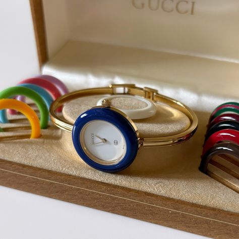 SOLD** Gucci interchangeable bezel bangle watch full set from the 90s will be available today at 5pm pacific time! Gucci Analog Watch For Business, Gucci Watch Vintage, Gucci Vintage Watch, Gucci Bezel Watch, Gucci Bezel Watch Vintage, Bangle Watches, Vintage Gucci, Bangles, Gucci