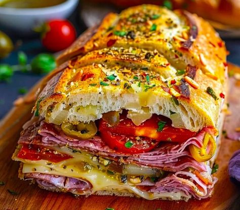 Classic Italian Muffuletta Sandwich Recipe - The Italian-American Page Muffaletta Bread, Chopped Italian Sandwich, Muffaletta Recipe, Olive Salad Recipe, Muffaletta Sandwich, Muffuletta Sandwich, Italian Butter Cookies, Sub Sandwich, Sandwhich Recipes