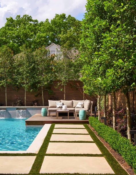 Texas home merges visual warmth with beautiful contemporary interiors Privacy Landscaping Backyard, Grass Pavers, Pool Decking, Pavers Backyard, Privacy Landscaping, Pool Remodel, Pool Landscape Design, Backyard Privacy, Pool Landscape