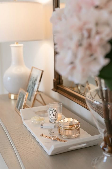 Dresser Table Decor, Perfume Tray On Dresser, Feminine Dresser Decor, Night Table Styling, Bedroom Update Ideas, Sophisticated Apartment Decor, Bed Side Table Decor Ideas, Dresser Decorating Ideas, Dresser Styling Ideas