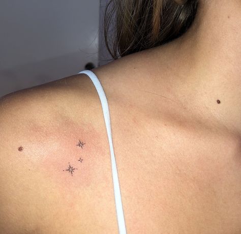 Done by @theghostkat. #tinytattoos #sparklestattoo #startattoos #thinlinetattoo Random Aesthetic Tattoos, Small Parisian Tattoos, Stick And Poke Tattoo Sparkle, Star Related Tattoos, Sparkles Tattoo Ideas, Sparkle Stick And Poke, Small Sparkle Tattoo Ideas, Feminine Dainty Tattoos, Tiny Sparkle Tattoo