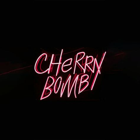 A photograph of a burgundy neon sign that reads "cherry bomb". Cherry Red Asthetics Wallpaper, Cherry Light, Cherry Red Astethics, Dark Cherry Aesthetic Wallpaper, Cherry Vibes, Cherry Astethic Wallpaper, Cherry Neon Sign, Dark Red Wallpaper, Cherry Baby