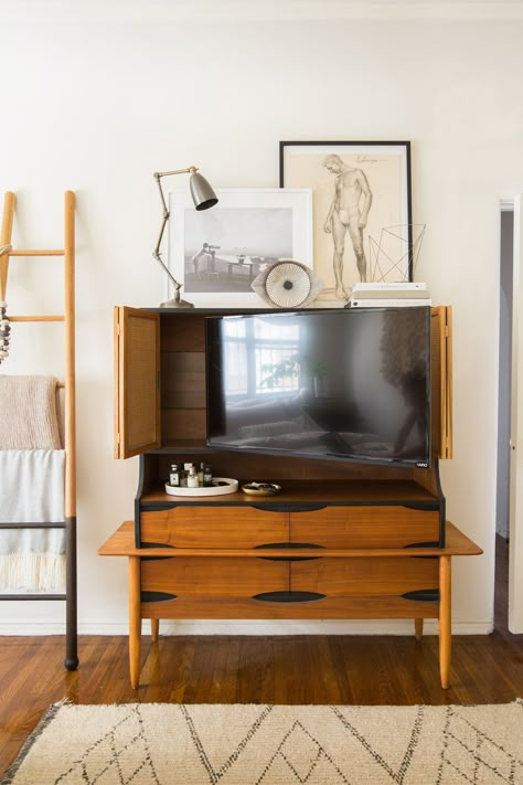 12 Clever Hidden TV Ideas - How to Hide a TV, According to Top Designers Tv Hutch, Tv Solutions, Hide Tv, Modern Home Decor Bedroom, Media Room Design, Tv Ideas, Hidden Tv, Tv Vintage, Tv In Bedroom