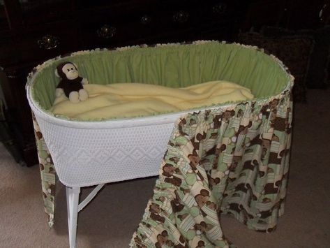 This is the first bassinet I covered, and it was a table top model. What ever bassinet you get make sure to first clean and paint first. Bassinets with legs are great for storing diapers and supplies under for a clutter free look. Because you are using fabric you can use any style, theme or colors you choose. I measured the top outside and inside rims of the bassinet. Then I quadrupled the amount of fabric to allow for the gathering. I gathered, sewed and hemmed the fabric. I g… Bassinet Skirts Diy, Bassinet Diy, Bassinet Ideas, Bassinet Skirts, Baby Items To Sew, Baby Bassinets, Bassinet Cover, Rocking Bassinet, Mother Daughter Projects