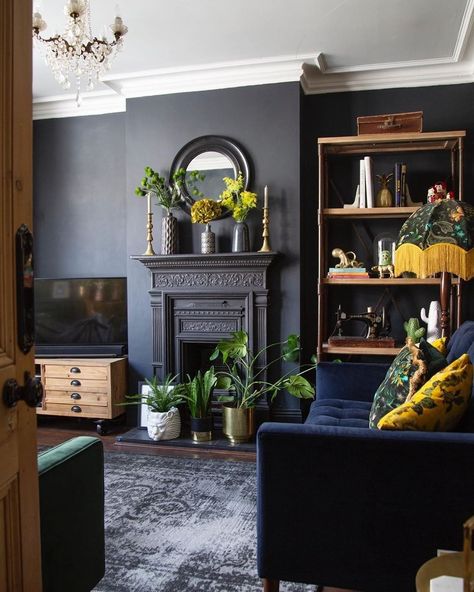 Painting a room black doesn't mean that it will automatically feel gothic. These easy tips and tricks will help you pull off this daring color. Black Room Ideas, Dark Living Room Ideas, Victorian Living Room, Black Rooms, Dark Living Rooms, Black Living Room, Room Black, Dark Interiors, Blue Living Room