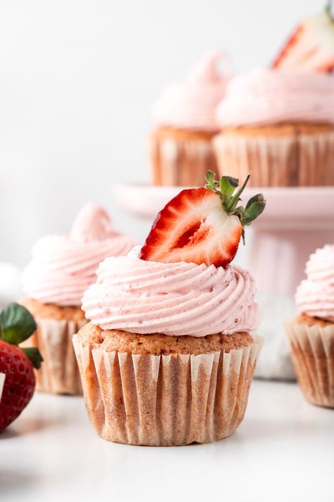 These vegan strawberry cupcakes are soft, fluffy, filled with fresh strawberries and topped with a naturally pink strawberry buttercream. Vegan Strawberry Cupcakes, Strawberry Buttercream, Strawberry Cupcakes, Pink Cupcakes, Pink Strawberry, Fresh Strawberries, Vegan Paleo, Fresh Strawberry, Vegan Food