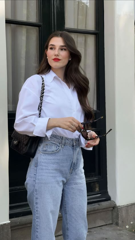 lauraspiessmacher on Instagram: Parisian vibes today - blue jeans and a white shirt is a must have! What do you think? 💋 #parisianstyle • #parisianvibes #parisianchic… White Shirt With Blue Jeans Outfit, White Shirt Blue Denim Women, Light Jeans And White Shirt Outfit, White Shirt Light Blue Jeans Outfit, White Chemise Outfit Casual, Blue Jean White Shirt Outfit, White Shirt And Blue Jeans Outfit, White Cotton Blouse Outfit, White Top And Blue Jeans Outfit