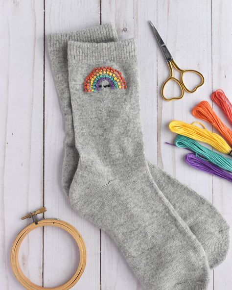 Do you know what you should do this weekend? Embroider rainbows on your socks! 🌈🧦 You can find my pattern and instructions for these in the latest issue of @simplysewingmag (issue 118). Let me tell you…they absolutely make me smile! As an added bonus, you can use your favorite rainbow of embroidery floss to truly make them your own! #embroidery #embroideredclothing #handstitched #instastitch #modernembroidery #kawaiicute #simplysewingmag #stitchupcycle Embrodery Socks, Embroider Socks Diy, Embroider Socks, Embroidery On Socks, Sock Embroidery, Socks Embroidery, Sock Ideas, Embroidery Socks, Embroidered Sweaters