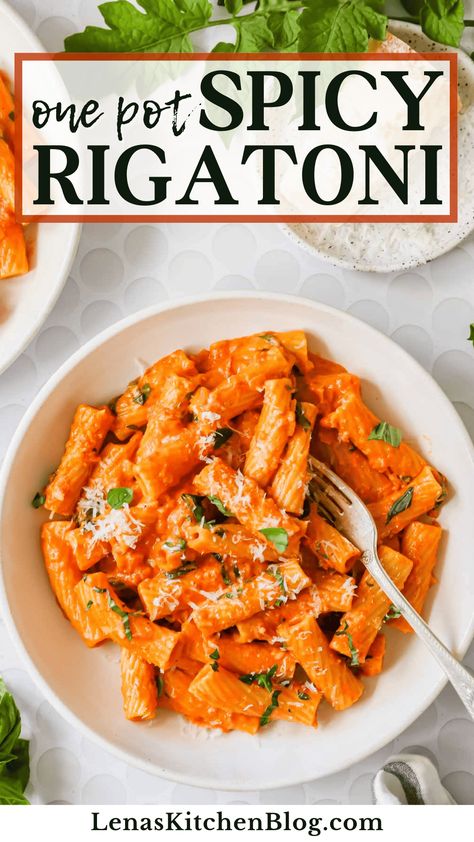 This spicy rigatoni is bursting with fiery flavors! Every forkful showcases the warmth of crushed red pepper, the richness of Parmesan and cream, and the tanginess of marinara. Red Sauce Rigatoni, One Pot Spicy Rigatoni, Spicy Sausage Rigatoni Pasta, Rigatoni Recipes Chicken, Creamy Spicy Rigatoni, Spicy Rigatoni Pasta Recipe, Spicy Pesto Sauce, Recipes With Raos Marinara, Rigati-pasta Recipe