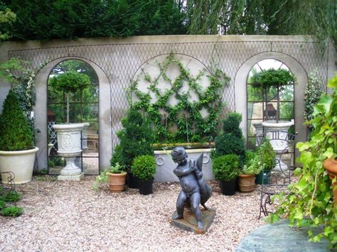 Potted shaped topiaries and latticed ivy are so inviting as one steals a moment of serenity. French Courtyard Garden Ideas, French Courtyard Garden, Front Yard Privacy, Courtyard Garden Ideas, French Courtyard, French Garden Design, Yard Privacy, Country Garden Design, French Gardens