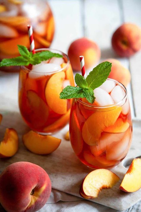 Mango Sangria, Fuze Tea, Fourth Of July Drinks, Fruit Sangria, White Wine Sangria, Peach Syrup, Peach Sangria, Peach Ice Tea, Peach Recipes