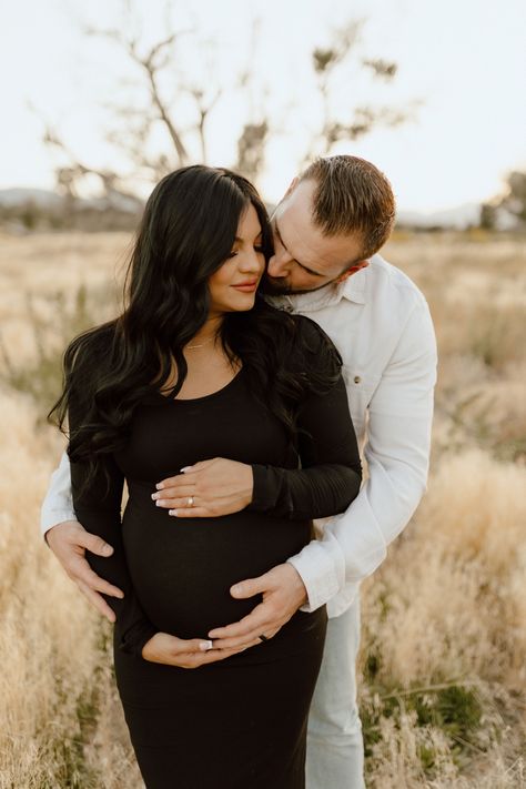 Maternity photoshoot outfit idea Maternity Session Black Dress, Pregnant Fall Wedding Guest Outfit, Maternity Photography Mens Outfit, Simple Maternity Pictures Outdoor, Christmas Maternity Pictures Couple, Maternity Pictures Poses Couple, Maternity Christmas Card Family Pictures, Maternity Pics Outside, Maternity Pics With Family