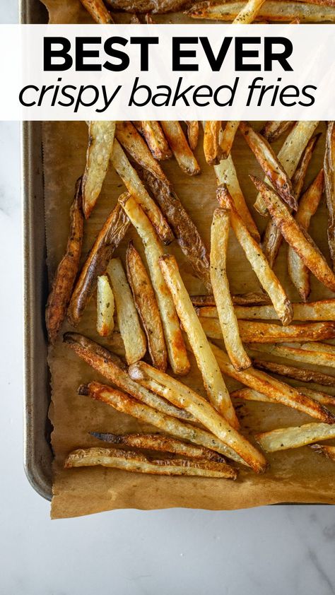 These are oven baked french fries that actually get crispy! Made a handful of ingredients and baked to produce a fried-like crispy exterior while remaining fluffy on the side. Making homemade french fries has never been easier! #frenchfries #bakedfries #crispyfrenchfries #crispyfries Homemade Fries In Oven, Homemade Baked French Fries, Crispy Baked French Fries, Oven Fries Recipe, French Fry Recipe Baked, Oven French Fries, Fries Recipe Oven, Oven Baked French Fries, Baked French Fries