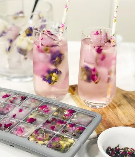 P.S.- I made this... on Instagram: “Serving up how to make pink lemonade floral ice cubes @amazon HQ! Link in bio for the full video, along with other yummy cold brew and…” Drink Essentials, Floral Dessert Table, Flowers In Ice, Bridal Shower Dessert Table, Floral Ice Cubes, Flower Ice Cubes, How To Make Pink, Flavored Ice Cubes, Floral Drink