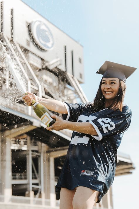 Penn State Grad Popping Champagne in front of Beaver Stadium Penn State Senior Pictures, Penn State Graduation Pictures, Penn State Graduation, Penn State College, Popping Champagne, Beaver Stadium, Graduation Pic Ideas, Graduation Pic, College Graduation Pictures