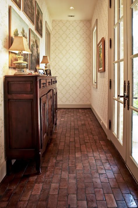 Brick Flooring: Timeless Beauty in the Home - Town & Country Living Brick Floor Kitchen, Country Entryway, Brick Bathroom, Brick Floors, Brick Floor, Dining Rug, Foyer Entryway, Brick Flooring, Elegant Dining Room