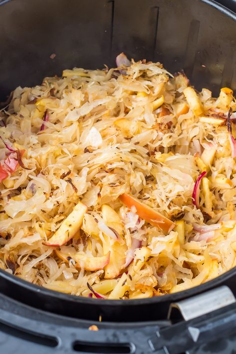 How To Cook Sauerkraut (4 Ways!) Sauerkraut And Apples Recipe, Apple Cider Sauerkraut, Sauerkraut With Apples And Onions, Cooked Sauerkraut Recipes, Sauerkraut Recipes With Caraway Seeds, Vegetarian Sauerkraut Dishes, Healthy Sauerkraut Meals, Sauerkraut Side Dish, Saurkraut Recipes Side Dish