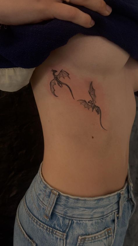 Rib Dragon Tattoo For Women, Simple Dragon Back Tattoo, Got Dragons Tattoo, Finger Tattoos Dragon, Rib Tattoos For Women Dragon, Rib Tattoo Dragon, Dragon Ribcage Tattoo, Hip Tattoos Women Dragon, Dragon Tattoo Ribcage