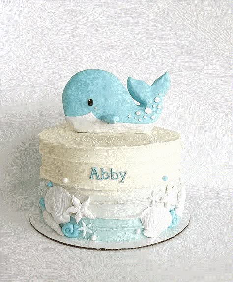 Whale Cake Design Images (Whale Birthday Cake Ideas) Ocean First Birthday Cake, Whale Party Ideas, Baby Beluga Birthday Party, Whale Cake Ideas, Sea Theme Birthday Cake, First Birthday Cakes For Boys, Whale Theme Birthday Party, Whale Birthday Theme, Fondant Whale