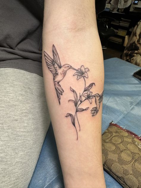 Hummingbird Tattoo Memorial Grandmothers, White Mariposa Flower Tattoo, Coverup Tattoo Ideas Ribs, Hummingbird Honeysuckle Tattoo, Cardinal Hummingbird Tattoo, Hummingbird And Carnation Tattoo, Inside Of Bicep Tattoo Women, Lily Hip Tattoos Women, Hummingbird Vine Tattoo