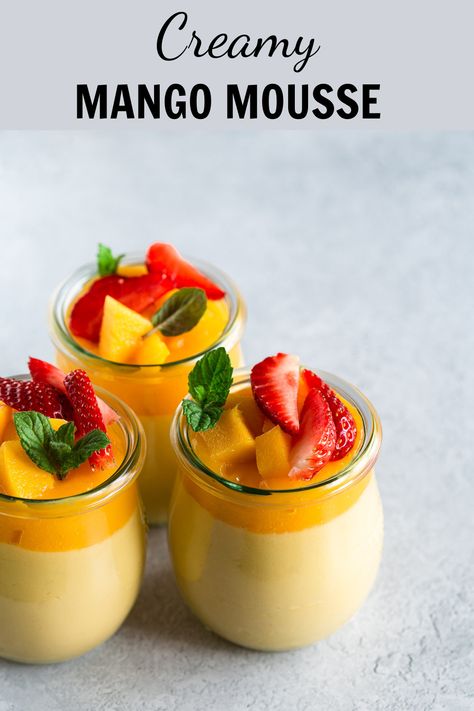 Three jars of creamy mango mosse cups or jars placed on a grey backdrop Mango Easy Dessert, Gelatine Desserts Recipes, Filipino Mango Dessert, Mango Mousse Cups, Quick Mango Dessert, Mango Mousse Cake Recipe, Fresh Summer Desserts, Summer Healthy Desserts, Mango Dessert Ideas