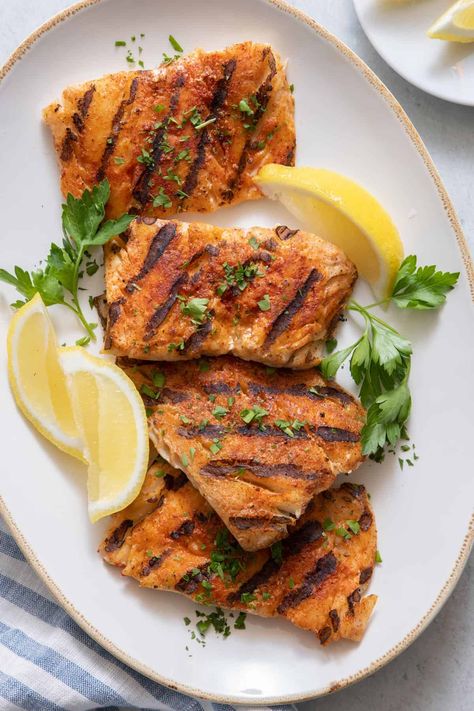 Deliciously moist grilled cod with a simple seasoning ready in just 15 minutes! Plus, helpful tips for keeping your cod from sticking to the grill! | Grilled Cod | Summer Grill Recipes | Grilling Fish | Weeknight Meal | Grilled Cod Recipes, Oven Baked Cod, Corn Grilled, Grilled Cod, Feel Good Foodie, Cod Fish Recipes, Grilled Fish Recipes, Frozen Fish, Crispy Fish