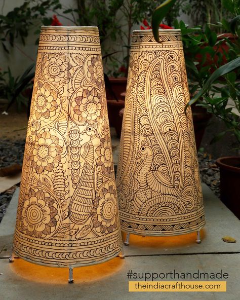 This beautifully crafted set of hand painted lamp shades are a lovely home accent, to add that extra touch of class to your decor. The translucent leather painting art form from Andhra Pradesh was originally used to make puppets for the popular shadow-puppet theatre tradition of Andhra Pradesh -‘Tholu Bommalata’- literally meaning “the dance of leather dolls Tholu Bommalata Designs, Lamp Shade Diy Ideas, Lamp Painting Ideas, Lamp Shade Painting, Hand Painted Lamp Shades, Indian Lighting, Leather Lamps, Creative Lamps Diy, Standing Lamp Shade