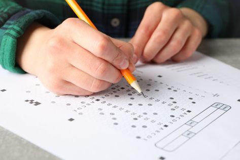 Young woman fills test sheet on grey tab... | Premium Photo #Freepik #photo #school #circle #paint #study Circle Paint, Photo School, Grey Table, Entrance Design, Premium Photo, Young Woman, Ideas De Fondos De Pantalla, Close Up, Vision Board