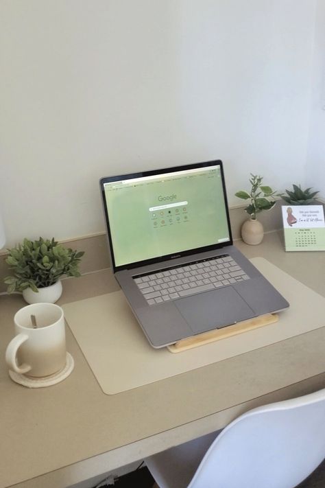 In this post, I’m taking you through every corner of my desk and sharing where I got all of my decor and tech accessories. I'm obsessed with neutrals, so I went all out with different shades of beige, white, cream, and for an accent - green by way of little fake plants. So, if you’re looking for some neutral and minimal inspiration to put together your desk, this is the post for you! Tap to keep reading. Business Green Aesthetic, Teacher Desk Aesthetic, Desk Aesthetic Minimal, Green Desk Aesthetic, Minimal Desk Decor, College Desk Setup, Desk Minimal, Different Shades Of Beige, Setup Minimalist