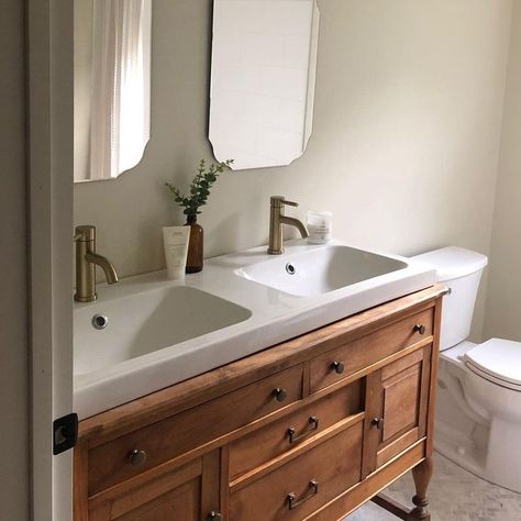 10 DIY Bathroom Vanity Ideas | The Family Handyman Antique Vanity Makeover Bathroom, Diy Vanity Dresser, Vintage Wood Vanity Bathroom, Furniture Used As Bathroom Vanity, Vintage Bathroom Vanity Makeover, Unusual Bathroom Vanity Ideas, How To Replace Bathroom Vanity, Sideboard Bathroom Vanity Diy, Dressers Turned Into Bathroom Vanities