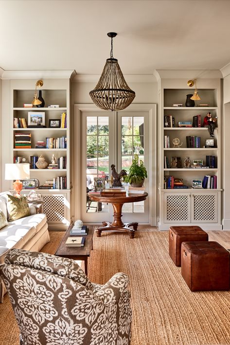 This living room and library features custom built-in cabinets with gorgeous sconces and interesting lighting. #livingroom #countrystyle #countrydecor #farmhousestyle #library Country Farmhouse Living Room, Living Room Library, Home Library Rooms, Living Room Built Ins, Room Library, Home Library Design, Design Salon, Farmhouse Living Room, Up House