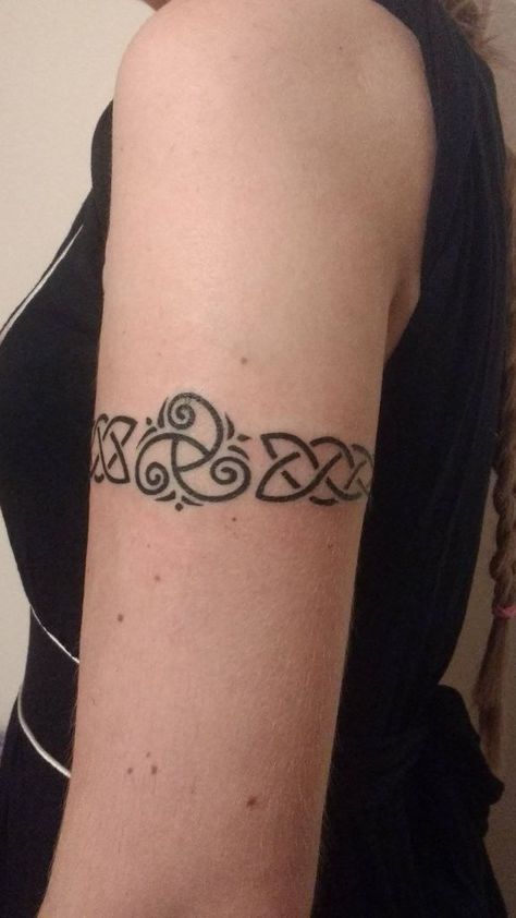 Celtic Knot Tattoo Ideas with Meaning Celtic Collar Bone Tattoo, Celtic Band Design, Celtic Sleeve Tattoos For Women, Celtic Family Symbol, Celtic Knot Band Tattoo, Celtic Ankle Tattoos For Women, Scottish Celtic Tattoo, Irish Knot Tattoo, Scandinavian Tattoo For Women