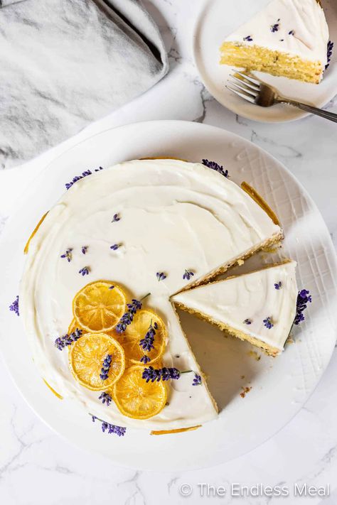 This lemon lavender cake is light and citrusy while also being delicately balanced with floral notes of lavender. Every bite is heavenly and moist and will bring the perfect finishing note to any garden party, afternoon tea, Mother's Day celebration, or baby shower. #theendlessmeal #cake #lemonlavendercake #lavendercake #lemoncake #dessert Lavender Lemon Cake, Lavender Cake Recipe, Lemon Lavender Cake, Lavender Dessert, Lemon Meringue Pie Easy, Candied Lemon Slices, Vegan Lemon Cake, Lemon Layer Cakes, Vegan Frosting