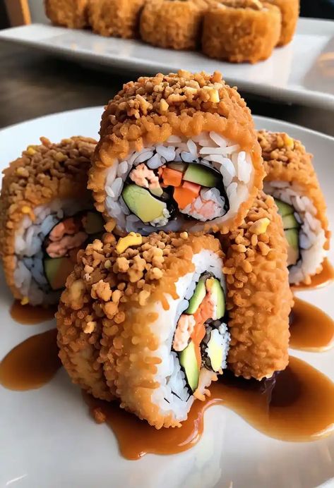 Deep Fried California Roll Recipe

Ingredients

- 1 cup sushi rice
- 1 1/4 cups water
- 1/4 cup rice vinegar
- 1 tablespoon sugar
- 1/2 teaspoon salt
- 4 sheets nori (seaweed)
- 1 avocado, sliced
- 1/2 cup crab meat or imitation crab
- 1/4 cucumber, julienned
- 1/2 cup tempura batter mix
- Vegetable oil for frying
- Soy sauce for serving
- Wasabi and pickled ginger for garnish

Full Cooking Instructions on... Deep Fried Sushi Rolls Recipes, Deep Fried California Roll, Fried California Roll, Fried Sushi Rolls, California Roll Recipe, Deep Fried Sushi, California Roll Recipes, Tempura Batter Mix, Fried Sushi