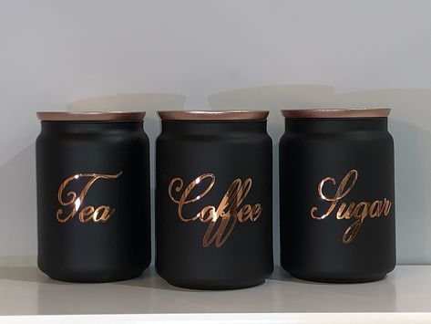 Tea Coffee Sugar Kitchen Storage Canister Set Of 3 Black Coffee Tea Sugar Rose Gold Canister https://etsy.me/2FRlD4b Black And Copper Kitchen, Black Kitchen Accessories, Tea And Coffee Canisters, Assiette Design, Coffee Canisters, Tea Coffee Sugar Canisters, Gold Kitchen Accessories, Rose Gold Kitchen, Kitchen Storage Canisters