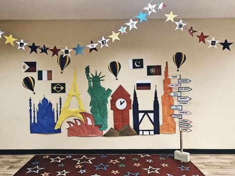 World Cultures Classroom Decorations, Around The World Vbs Decor, Around The World Float Theme, Around The World Stage Decor, Around The World Theme Decorations, Around The World Homecoming Theme, Library Adventure Theme, International Decorations Ideas, Around The World Bulletin Board Ideas