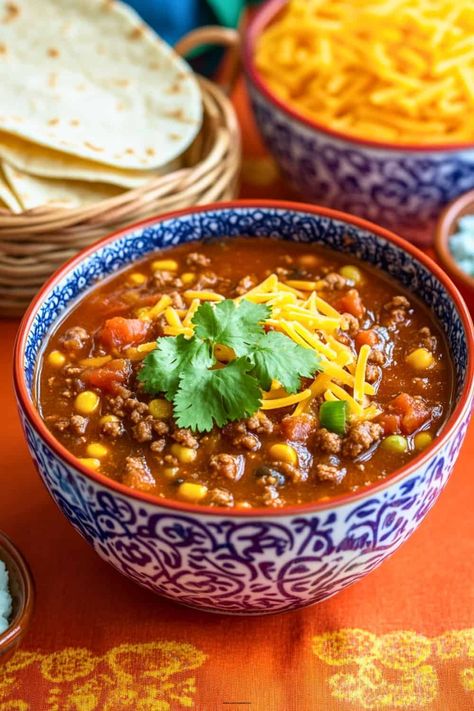 There’s something about making a pot of this easy, healthy taco soup that feels like an instant mood boost. Every time I pull out my soup pot to make some yummy fall soups, I know my family’s about to dig into something hearty, healthy, and super tasty. Taco soup is one of those “just right” […] Cheap Dinners Healthy, Stove Top Taco Soup, Taco Soup With Ground Beef, Healthy Taco Soup, Quick Fall Recipes, Crock Pot Tortellini, Healthy Crockpot Soup, Easy Crockpot Soup, Crockpot Soups