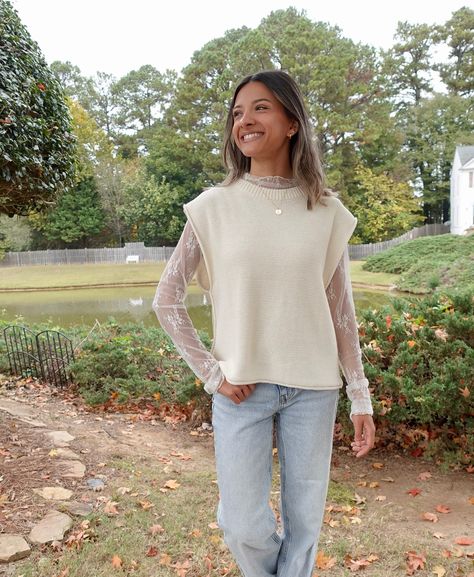 NEW ARRIVAL ALERT! Introducing the Rowan sweater vest in cream. You guys always sell out any neutral sweater vests I bring in. Bringing a new one in was long overdue… set your alarms for tomorrow, 11.3 at 6pm est!🤍 #NewArrival #SweaterVest #FallLayers #NeutralOutfit #BoutiqueStyle #RowanVest #FallFashion #WardrobeStaple #ModestFashion #ShopSmall Tunic Sweater Vest Outfit, High Neck Sweater Vest Outfit, Sweater Vest With Lace Undershirt, Womens Sweater Vest Outfit, Styling A Sweater Vest, White Sweater Vest Outfit, Sweater Vest Outfits For Women, Collar Under Sweater, Lace Undershirt