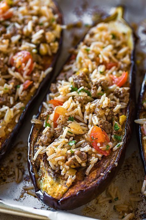 This savory stuffed eggplant with middle eastern spices and a garlic tahini sauce Different Meat Recipes, Eggplant Minced Meat Recipes, Turkish Healthy Recipes, Stuffed Egg Plant Recipes, Healthy Meal Prep No Meat, Egg Plant Dinner, Turkish Stuffed Eggplant, Eggplant Recipes With Meat, Eggplant Rice Recipes