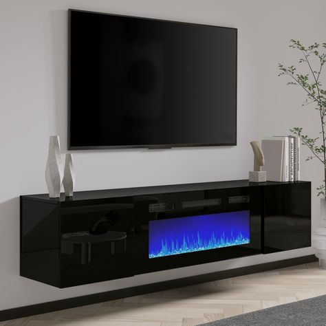 Super sleek floating design! Love the ambiance and feel it gives to the room! Led Fireplace Tv Stand, Floating Entertainment Center With Fireplace, Mounted Tv With Fireplace, Floating Fireplace Tv Stand, Floating Tv Stand With Fireplace, Floating Fireplace Ideas, Unique Tv Stand Ideas, Tv Stands With Fireplace, Fireplace Tv Stand Decor