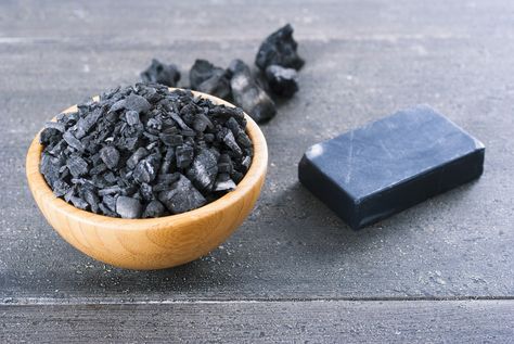 Activated charcoal, also known as activated carbon, is a powder made when common charcoal is heated in such a way as to develop lots of internal spaces or ‘pores’ which help to trap chemicals. This pure black powder – which is used in gas masks and water purifiers – is also sold in capsule form, and is a common additive in many skincare products. You… [read more] Activated Charcoal Uses, Charcoal Mask Benefits, Activated Charcoal Benefits, Raw African Black Soap, Charcoal Uses, Diy Beauty Products, Green Tea Mask, Charcoal Soap, Face Mask Recipe