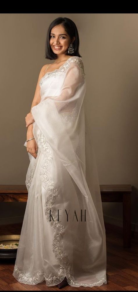 Plain white saree
Organza saree
Floral design
Lace design
Classy saree
Elegant design Baptism Saree, White Sarees, Floral Dress Outfits, Lace Saree, Floral Saree, Party Sarees, White Saree, Organza Sarees, Wedding Sarees