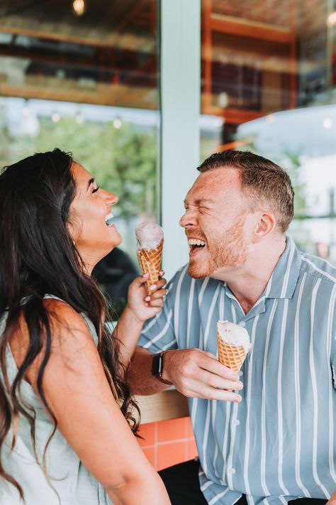 Couple laughing while holding their ice cream cones. Ice Cream Maternity Photoshoot, Engagement Photos With Ice Cream, Engagement Shoot Ice Cream, Ice Cream Maternity Shoot, Ice Cream Mini Session, Ice Cream Couple Photoshoot, Ice Cream Date Photoshoot, Coronado Photoshoot, Ice Cream Photoshoot Ideas