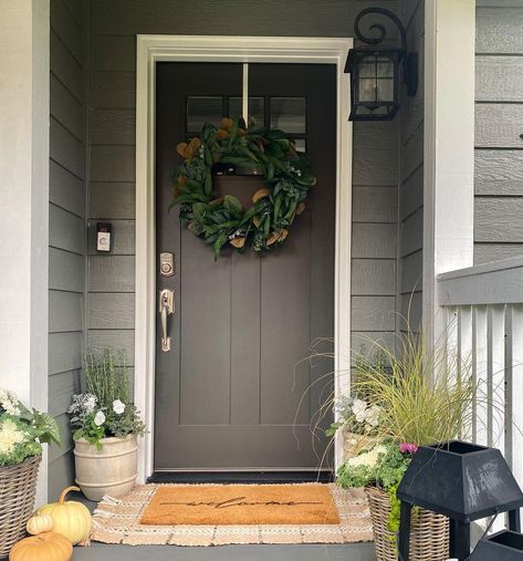 https://www.homedit.com/sherwin-williams-urbane-bronze/ Urbane Bronze Sherwin Williams Exterior Door, Dark Gray Door Exterior, Sw Urban Bronze Front Door, Dark Door Paint Color, Black Fox Front Door Sherwin Williams, Sw Urbane Bronze Front Door, Sherwin Williams Peppercorn Door, Dark House Front Door Color, Urbane Bronze Door Exterior