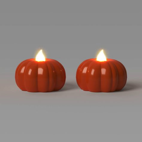 Add a festive glow to any room with the 2-Pack of LED Pumpkin-Shaped Halloween Tea Lights from Hyde & EEK! Boutique™. These orange pumpkin-shaped tea lights are made of plastic and are battery powered. Designed for indoor use only, they light up with an LED-bulb faux flame for a convenient and safe decor accent. Hyde & EEK! Boutique™: Thrilling delights. Curious oddities. Garfield Halloween, Halloween Centers, Halloween Sleepover, Sewing Tattoos, Target Fall, Holiday Room Decor, Target Halloween, Outdoor Halloween Decorations, Holiday Room