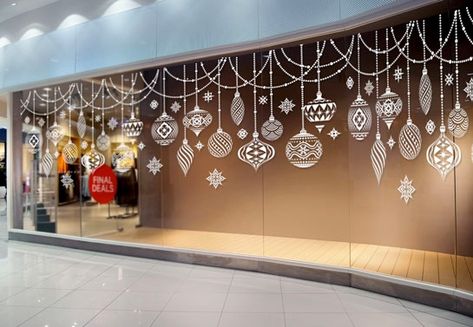 Christmas Retail Displays: 43 Creative Ideas & Examples Christmas Window Vinyl Ideas, Christmas Window Painting Ornaments, White Window Painting Christmas, Christmas Decoration Store, Christmas Window Art Ideas, Christmas Window Ideas, Christmas Window Display Retail, Ornaments Template, Christmas Window Art