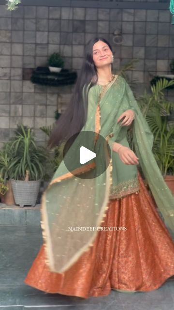 NAINDEEP KAUR on Instagram: "This outfit is made of a beautiful and everlasting sage green shirt which is paired with orange rust, pure brocade heavy flared sharara. It is decorated with intricate patterns that display a captivating design style and an elegant charm.  Outfit : @naindeepkaurcreations  . . #formals #semiformals #partydresses #partywear #weddingdress #pret #couture #bridal #bridalwear #punjabisuits #ethnicwear #vintagewesternwear #class #classicwear #royal designersuits #designerdresses #reels #trendingreels #reelsinstagram #reelsinstagram #reelsvideo #HauteCouture, #CoutureFashion, #DesignerWear, #LuxuryFashion #FashionElegance #CoutureMagic" Brocade Sharara Suit, Orange Sharara Suit, Brocade Suit Design, Sharara Dress Design, Sharara Designs Party Wear, Sharara Suit Indian Designers, Brocade Dress Styles, Partywear Dresses Indian, Brocade Sharara