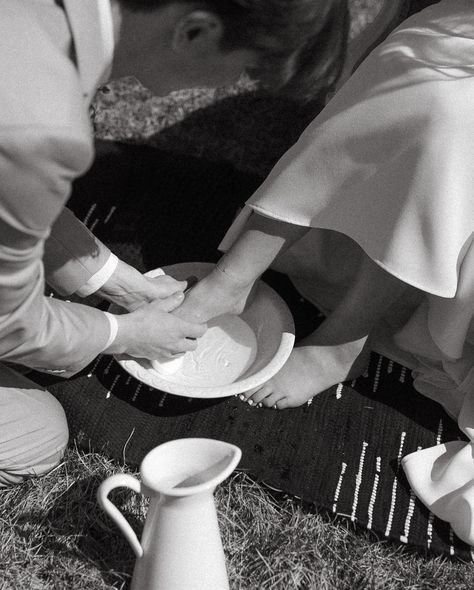 Feet washing wedding photo. Intimate ceremony and first look moment. black and white wedding photos. Midwest wedding Washing The Feet Wedding, Washing Each Others Feet Wedding, Unity Ceremony Feet Washing, Wash Feet At Wedding, Feet Washing Wedding Ceremony, Groom Helping Bride Get Ready, Washing Of The Feet Wedding, Feet Washing Ceremony Wedding Meaning, Footwashing Ceremony Wedding